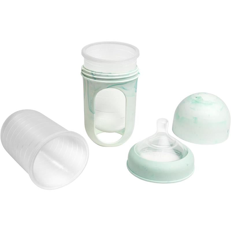 Boon Nursh 8 oz baby bottle in mint tie dye, featuring a silicone sleeve, a clear cap, and a removable silicone nipple.