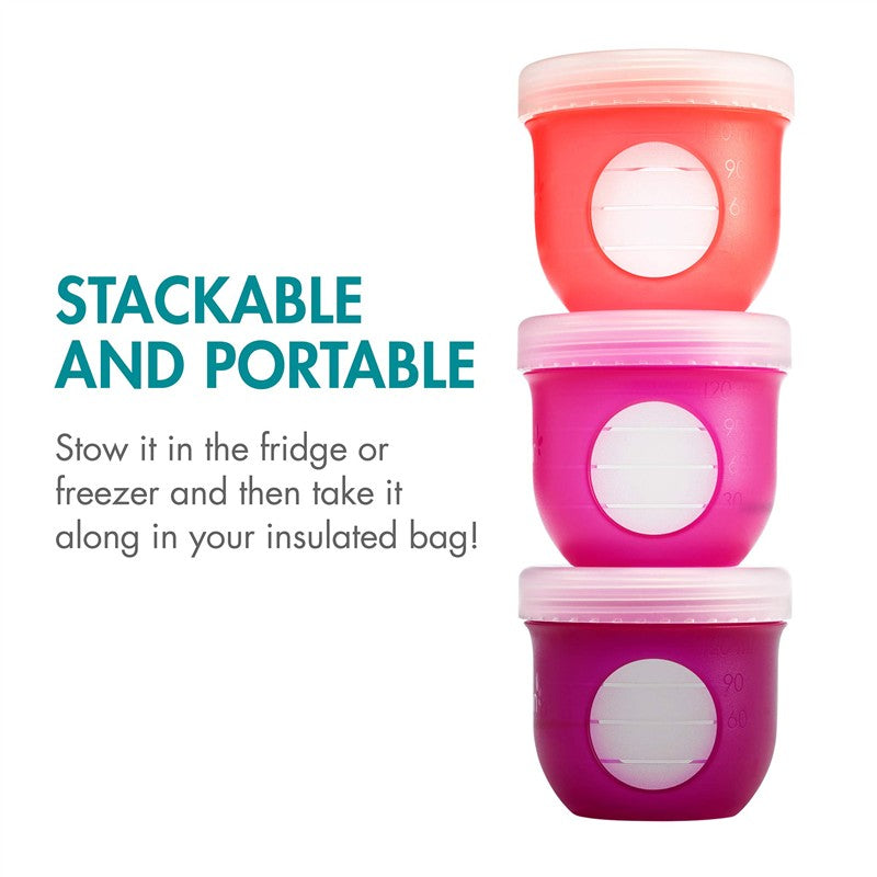 Boon NURSH Storage Caps 3-Pack in vibrant pink and coral colors, designed for stacking and portability, with measurement markings.