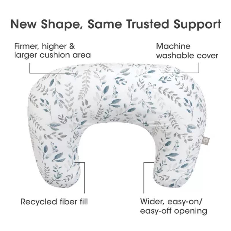 Boppy Nursing Pillow in beige foliage pattern with machine washable cover, labeled features like recycled fiber fill and easy-off opening.