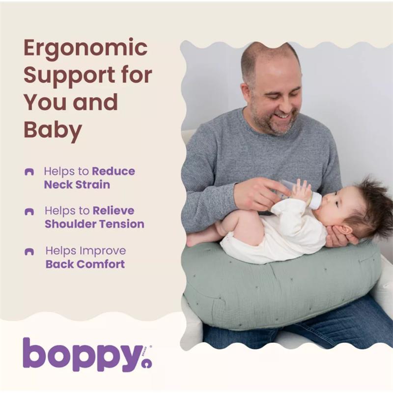 Boppy Nursing Pillow Luxe in sea green, supporting a man feeding a baby, with ergonomic benefits listed.