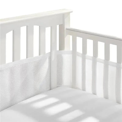 Classic Breathable Mesh Crib Liner in white, fitted securely in a white crib, providing safety while enhancing airflow.