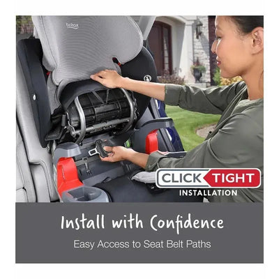 Britax Grow With You ClickTight Harness Booster Car Seat in grey; a user demonstrates installation with easy access to seat belt paths.