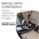 A person installing the Britax ClickTight car seat base into a car seat, highlighting the ease of installation with clear instructions visible.
