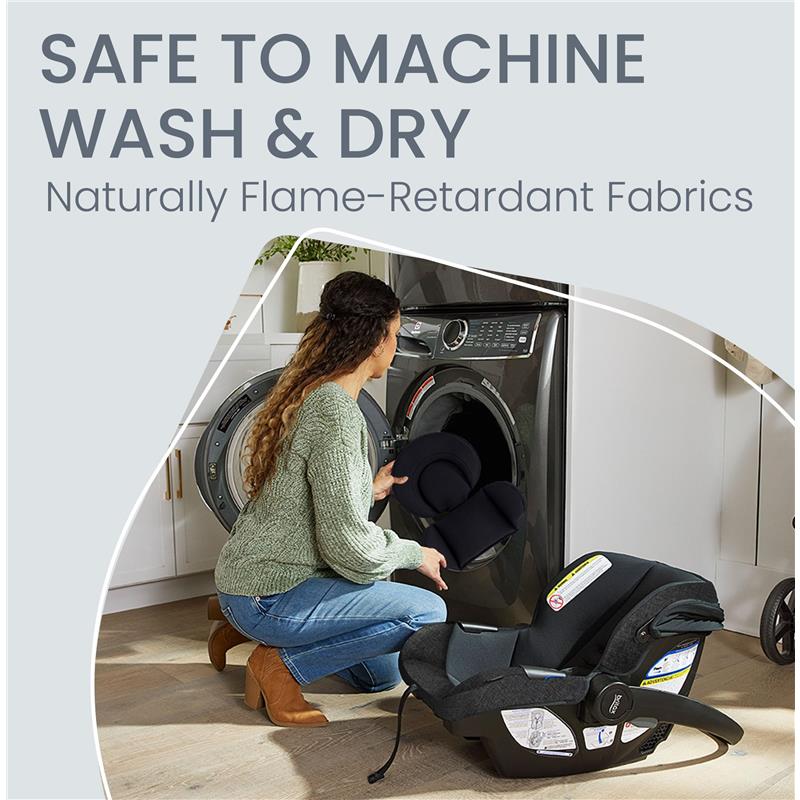 A woman places a car seat insert into a washing machine, highlighting the Britax Willow Brook S+ Travel System with safe-to-wash features.