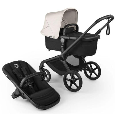 Bugaboo Fox 5 Renew Complete Bassinet & Seat in Black, Heritage Black, and Misty White, featuring a stroller frame and detachable seat.