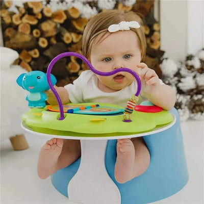 Bumbo Playtop Safari Suction Tray features a baby interacting with colorful toys and an elephant figure.