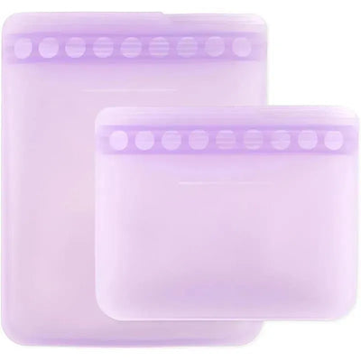 Lavender Bumkins silicone reusable bags, two sizes, with a smooth texture and a multi-button closure.