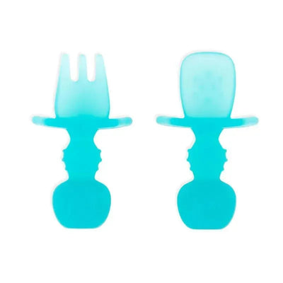 Chewtensils Silicone baby utensils set in blue jelly, featuring a fork and a spoon with soft, ergonomic handles.