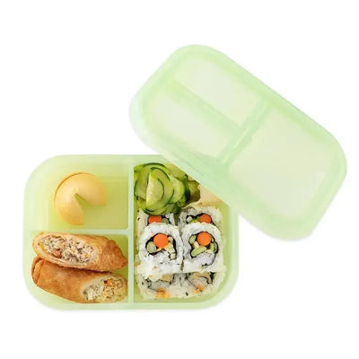 Bumkins green jelly snack/lunch bento box with three compartments, filled with sushi, spring rolls, cucumber, and a fortune cookie.