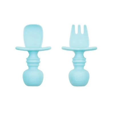 Silicone Chewtensils set in blue, featuring a spoon and fork designed for infants to encourage self-feeding.