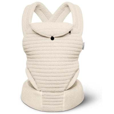 Bumpsuit The Armadillo Baby Carrier in Cloud color, featuring a textured, soft fabric design with adjustable straps.