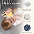Organic cotton crib sheets set featuring a sleeping baby with a plush toy, highlighting sheet details like premium elastic and softness.