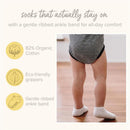 Burts Bees 6Pk Multi Ankle Socks in Oat shown on a baby, featuring a gentle ribbed ankle band and eco-friendly grippers.