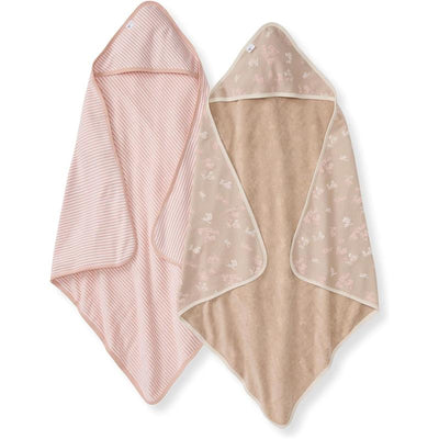 Hooded baby towels in hummus color, featuring a pink striped pattern on one side and a floral design on the other.