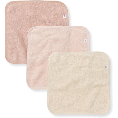 Three organic cotton baby washcloths in pink sand shades, featuring a soft knit terry texture and a tag.