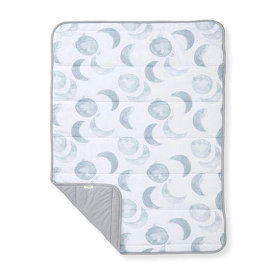 Reversible blanket featuring a moon and crescent pattern in soft gray tones, ideal for cozying up.