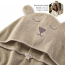 Organic cotton toddler hooded towel featuring a bear design, with ears and facial embroidery. Ideal for after-bath use.