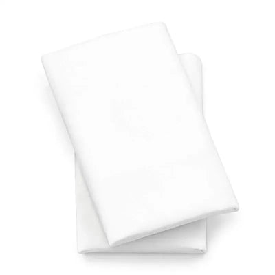 Chicco 2 pack of white lullaby playard sheets, featuring soft fabric, neatly stacked for bedding use.