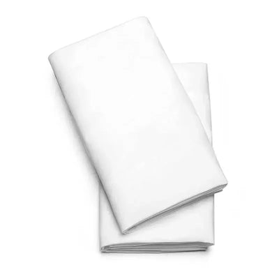 Two folded white sheets designed for Chicco Lullago bassinets, soft and suitable for infant use.