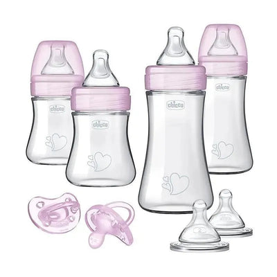 Duo Newborn Baby Bottle Starter Gift Set by Chicco, featuring three bottles with pink tops and two pacifiers.
