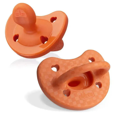 Chicco PhysioForma Luxe silicone pacifiers in terracotta color for babies aged 16-24 months, featuring heart-shaped ventilation holes.
