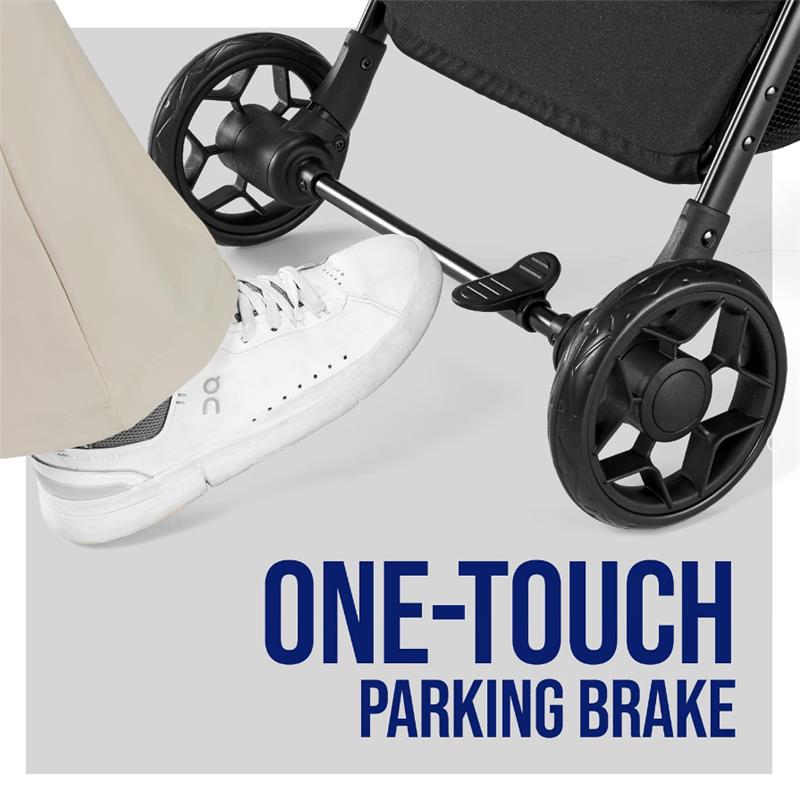 Foot pressing a one-touch parking brake on the Chicco Urbino Lightweight Stroller, with black wheels visible.