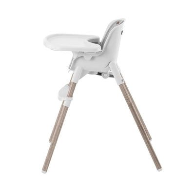 Chicco Zest Le 4-In-1 Folding High Chair in Crema, featuring a white plastic seat and wood-tone legs.