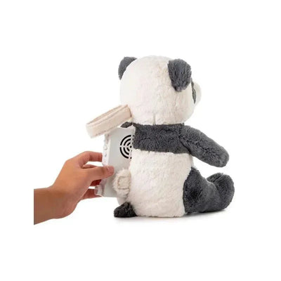 Peaceful Panda plush toy with a soothing sounds device, featuring a hand adjusting the sound controls from the back.