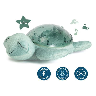 Tranquil Turtle night light in green, featuring a soft plush design with a transparent shell and soothing sound effects.