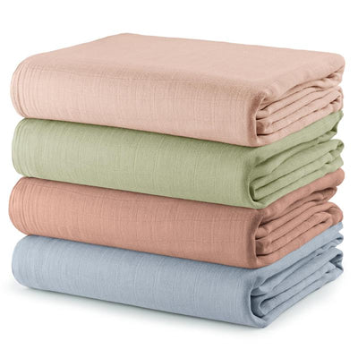 Four muslin swaddle blankets stacked vertically in pastel colors: blush, sage, cedar, and pacific.