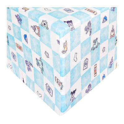 Premium crib sheet featuring a light blue checkered pattern with Monsters Inc characters and playful designs.