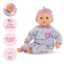 Soft-bodied Corolle Bébé Calin Capucine doll with sleeping eyes, wearing floral pajamas and a pink headband, vanilla-scented.