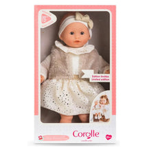Bébé Calin Margaux doll in a white dress with gold polka dots and a furry vest, packaged in pink box, limited edition.