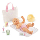 Corolle Dolls Tulip Changing Accessory Set featuring a baby doll, diaper, changing mat, bottle, lotion, a cup, and a yellow potty.