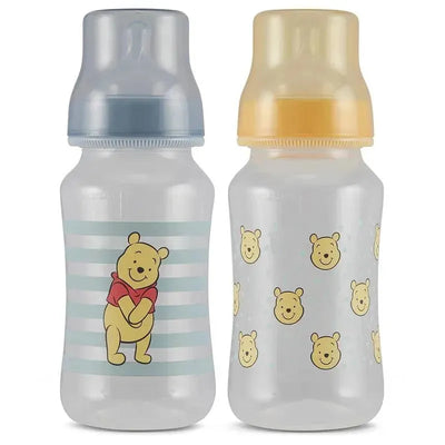 Two 11 oz baby bottles featuring Winnie the Pooh designs; one with Pooh in a red shirt and stripes, the other with repeating Pooh faces.