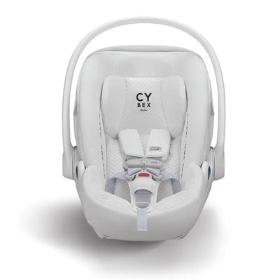 Cybex Cloud T Comfort Extend Infant Car Seat in Urban Mobility White, featuring a padded interior and adjustable harness system.