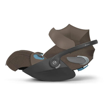Cybex Cloud T SensorSafe Infant Car Seat in Coconut Brown, featuring a protective canopy and safety harness system.