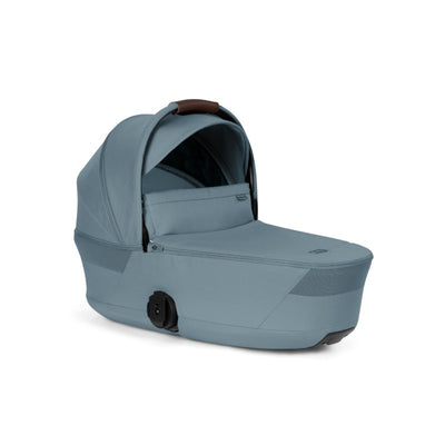 Cybex Gazelle S Cot in Stormy Blue features a foldable design with a canopy and a sturdy base.