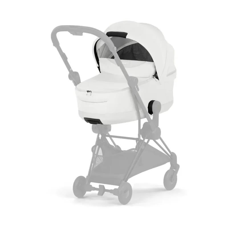 Cybex Mios/Coya Fold Lux Carry Cot in Urban Mobility White, showcasing its sleek design and comfort features for infants.