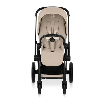 Cybex Priam stroller featuring a matte black frame and a cozy beige lux seat, designed for comfortable transport of children.