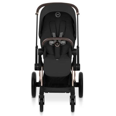 Cybex Priam stroller with a rose gold frame and sepia black luxury seat, shown from the front view.