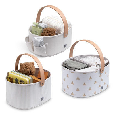 Tan nested fabric storage bins with handles, featuring diapers, wipes, and a teddy bear, in three different designs.