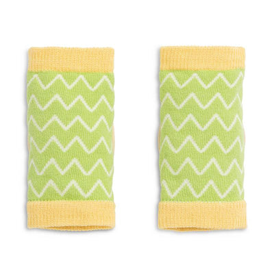 Green and yellow knee pads for infants with a zigzag pattern, designed for protection while crawling.