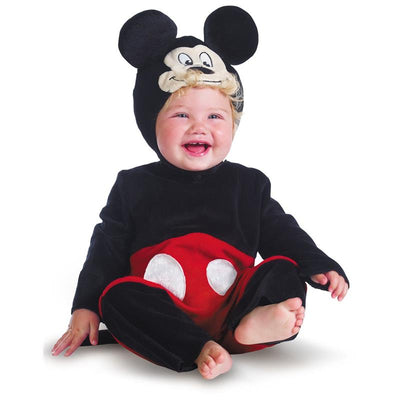 Infant wearing a black and red Mickey Mouse costume with ears, smiling while seated, showcasing the festive design.