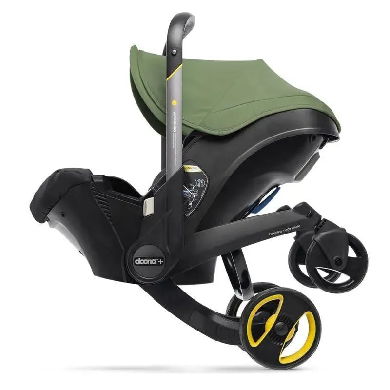 lime green car seat and stroller Doona Infant Car Seat & Stroller Desert Green