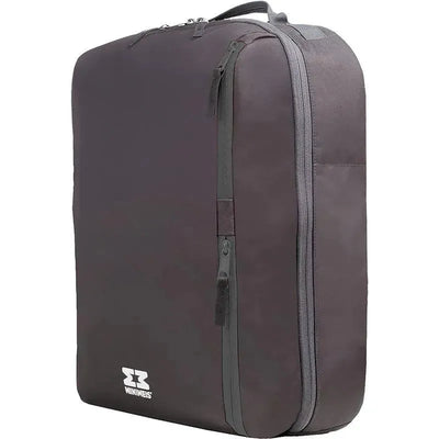 Black and grey Minimeis Universal G4 Backpack, featuring a zippered compartment and a logo on the front.