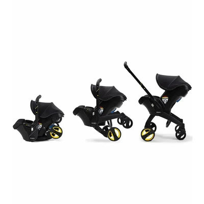 Doona Infant Car Seat and Stroller in Midnight, showcasing three configurations: car seat, stroller, and car seat attached to stroller.