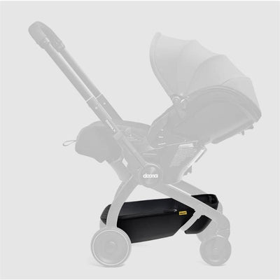 Black Doona X Storage Basket attached to a Doona stroller, designed for convenient storage underneath the seat.