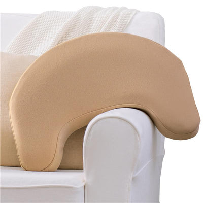 Dr. Brown Feeding & Nursing Lap Support Pillow in Gentle Beige, resting on a white couch, designed for nursing comfort.