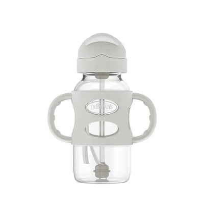 Wide-neck sippy straw bottle with silicone handles in gray, designed for toddlers, featuring a clear body and a secure lid.